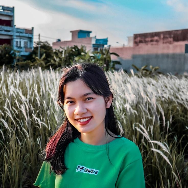 Kaveri Mehta, Lead Design Curator at Grove Field Mint, reviewing corporate floral arrangements